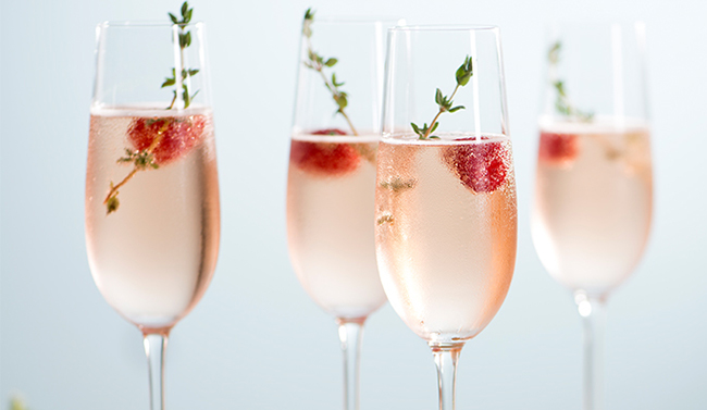 Glasses of sparking rosé with strawberries