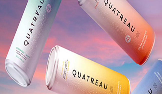 Quatreau cans against a neutral backdrop