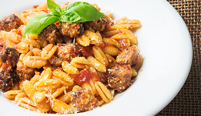 Pasta with sausage and tomatoes