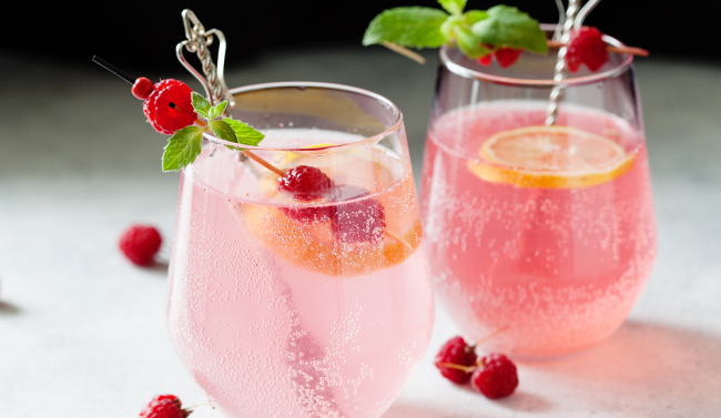 Glasses of zinfandel with rose petals
